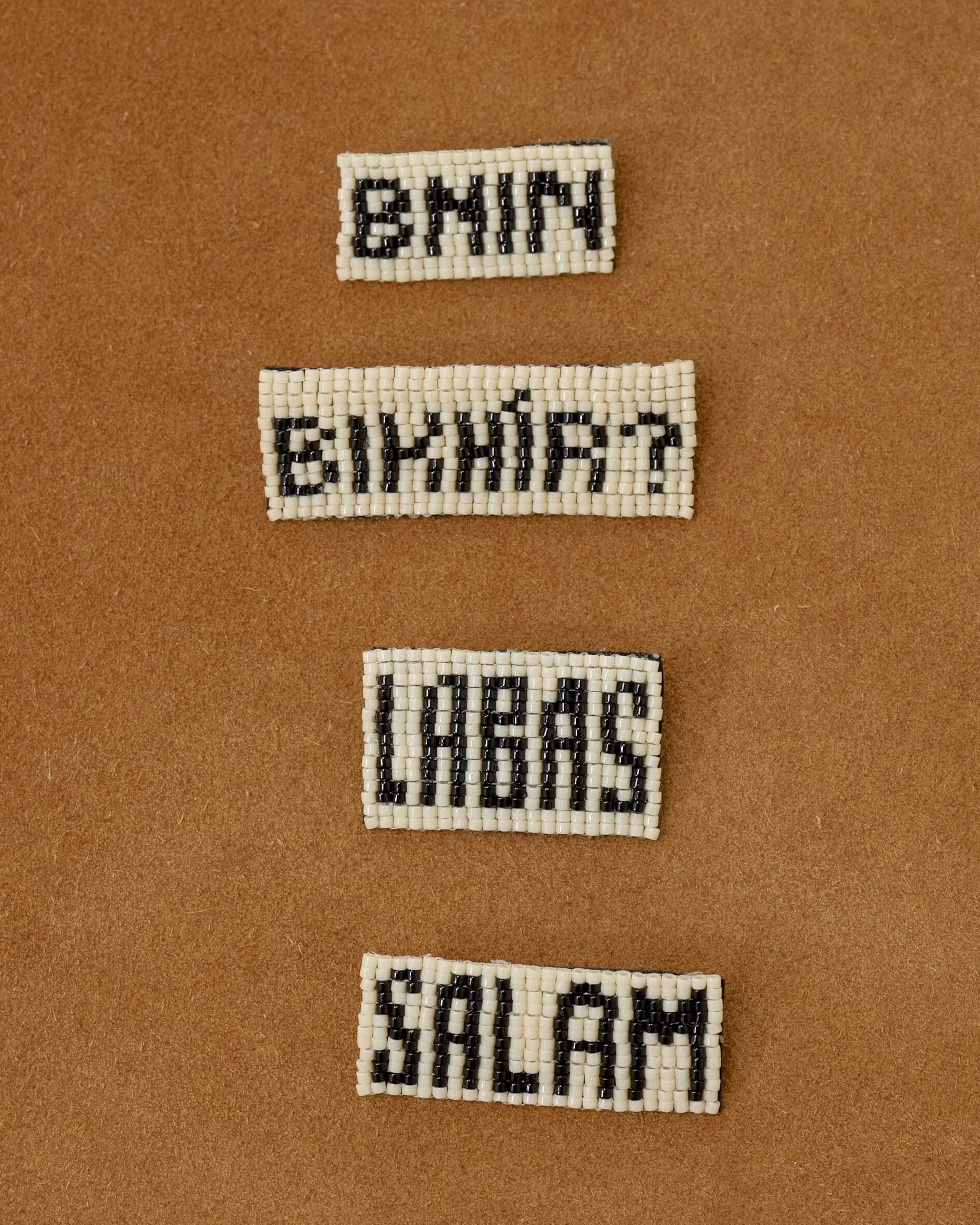LY Salam brooch